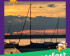 Ein Boot auf dem Ammersee in der Abenddämmerung.