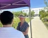 Christiene Jouaux-Frönd steht an einem Volt Infostand.