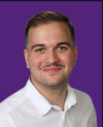 Portraitfoto von Kevin Fröhlich-Rosas.